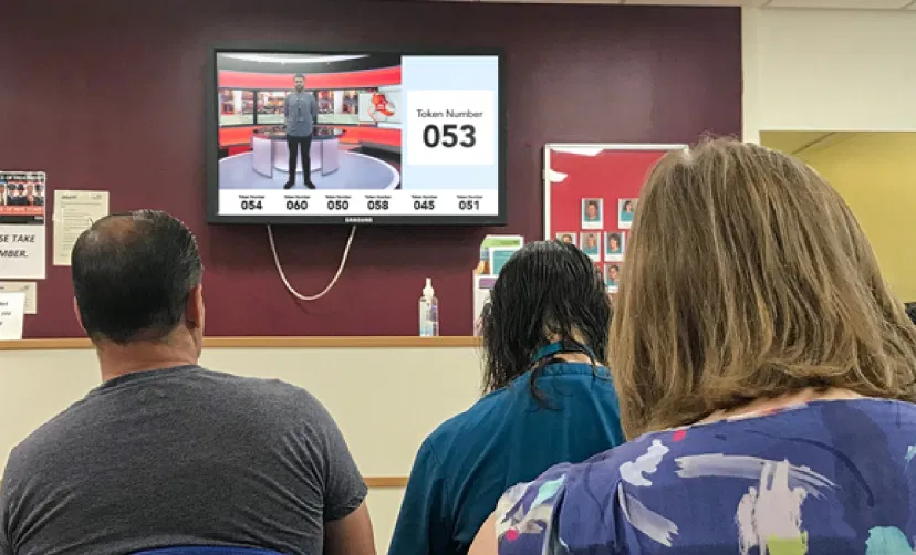 Digital signage screen placed on hospital lobby wall showing Fox news feeds from Pickcel digital signage software