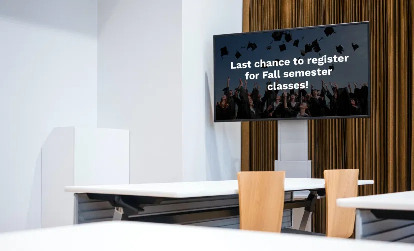 Digital signage screens in an educational institution showing Text Board using Pickcel digital signage software