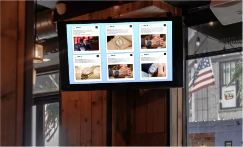 Digital signage screen displaying trending Twitter hashtag posts using Pickcel's Twitter app