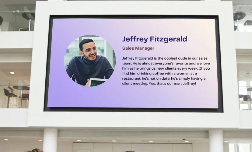 digital signage at the entrace of a meeting room displaying team profiles from Meet Your Team app digital signage at the entrace of a meeting room displaying team profiles from Meet Your Team app