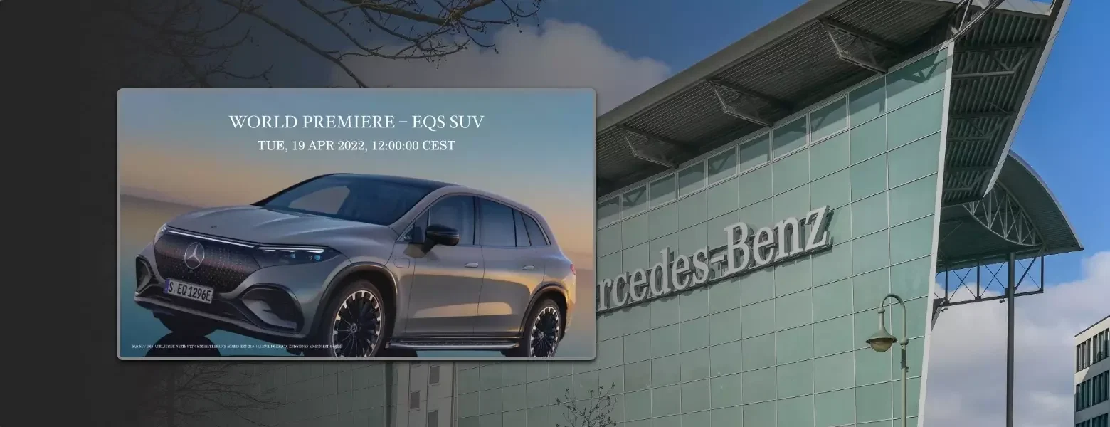 Mercedes-Benz corporate communication digital signage In the foreground of Mercedes-Benz corporate office building, a digital signage display showing the launch of a brand new Mercedes model